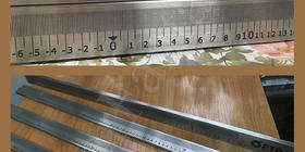 Нанесение гравировки на две стороны объёмной линейки 830х40х10мм