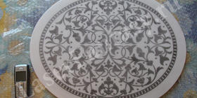 Лазерная гравировка на белом мраморе. Элемент отделки интерьера. Раскрашено